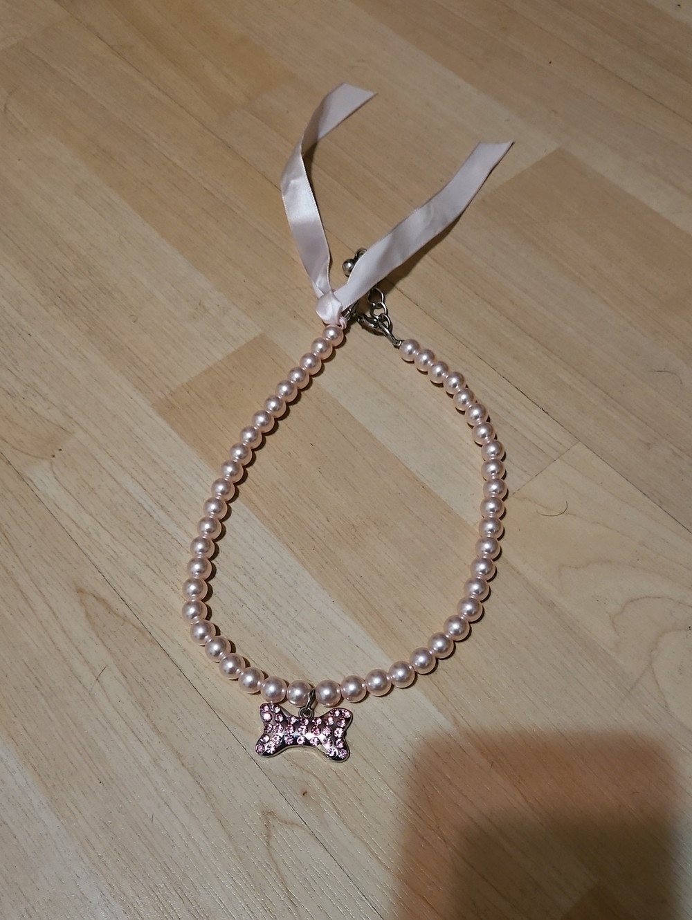 Pearl Bead Necklace with Pink Crystal Bone Charm